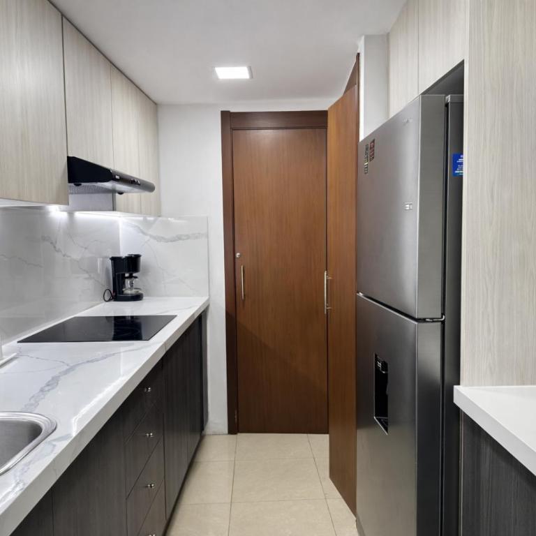 Exclusivo loft dúplex en piso 15 con vista panorámica al río en Guayaquil, 2 habitaciones y cocina equipada - Two-Bedroom Apartment - 31