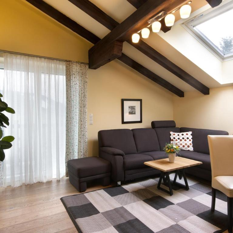 Alpenlandhaus Menardi - Apartment mit 2 Schlafzimmern und Balkon - 10