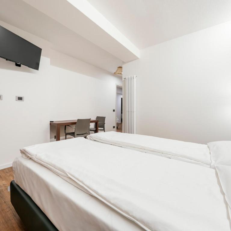 Nord Hotel - Camera Familiare con 2 Camere da Letto e 2 Bagni - 1