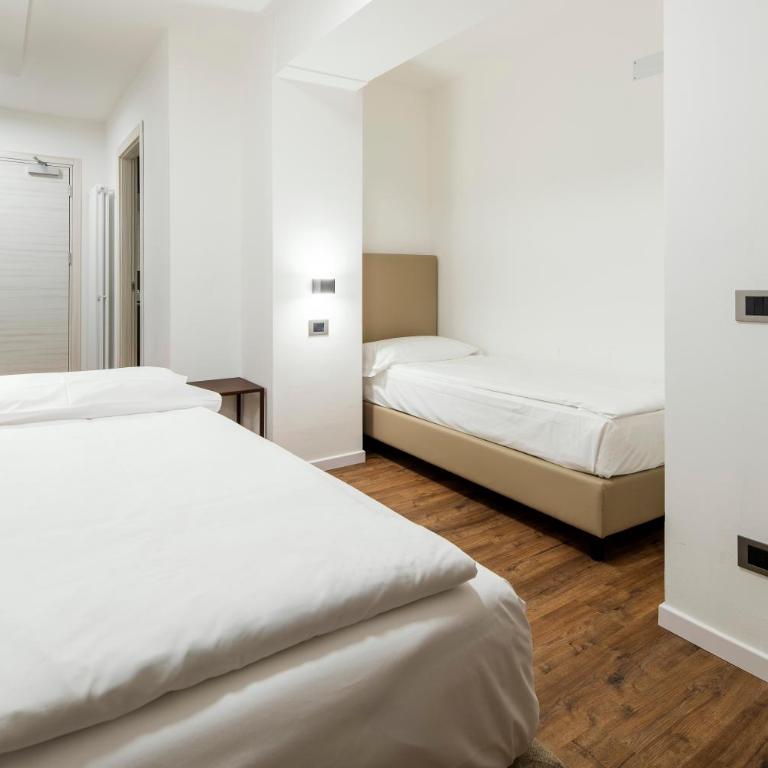 Nord Hotel - Camera Familiare con 2 Camere da Letto e 2 Bagni - 1