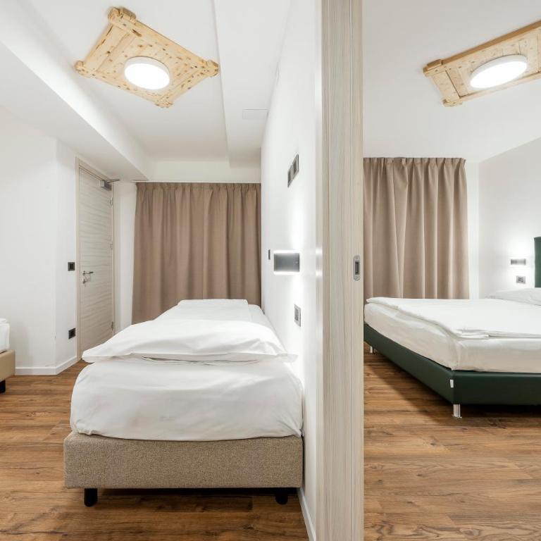 Nord Hotel - Camera Familiare con 2 Camere da Letto e 2 Bagni - 2
