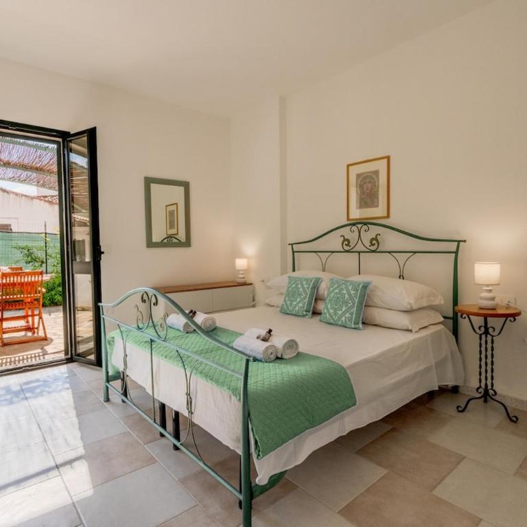4 minuti dalla Spiaggia - Elegante Villetta a Budoni - Appartamento con 2 Camere da Letto - 4