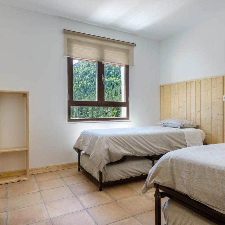 Camping Selva de Oza - Habitación Cuádruple con baño privado - 2