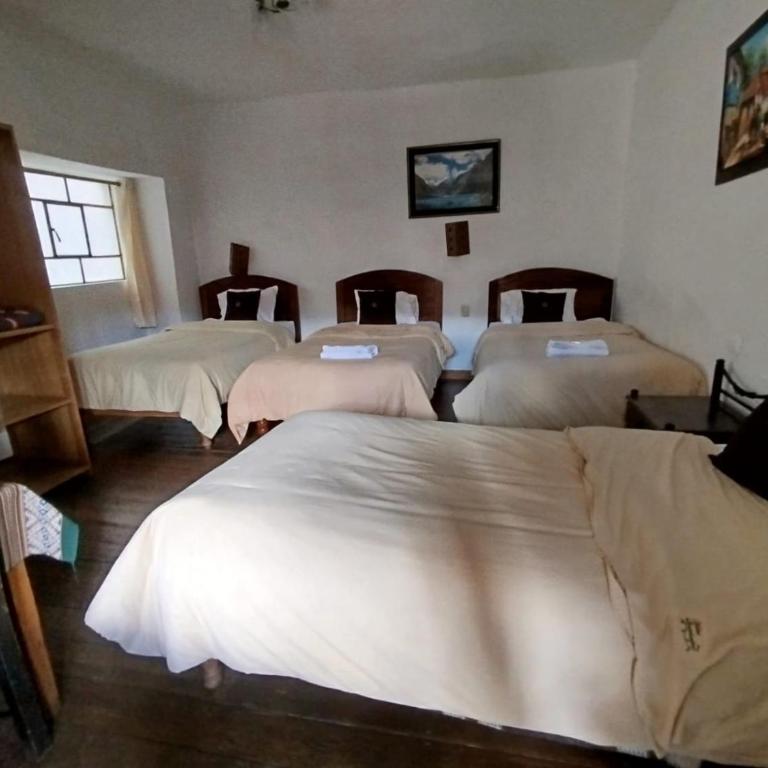 Hostal Qorichaska - Habitación Cuádruple Estándar - 1