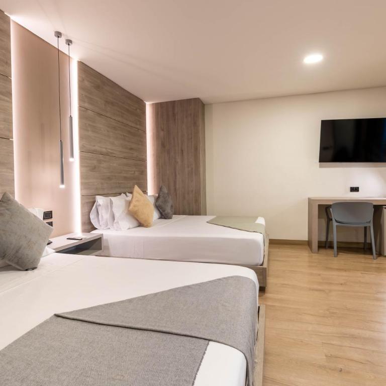 Hotel Time Oclock - Habitación Cuádruple Deluxe - 2