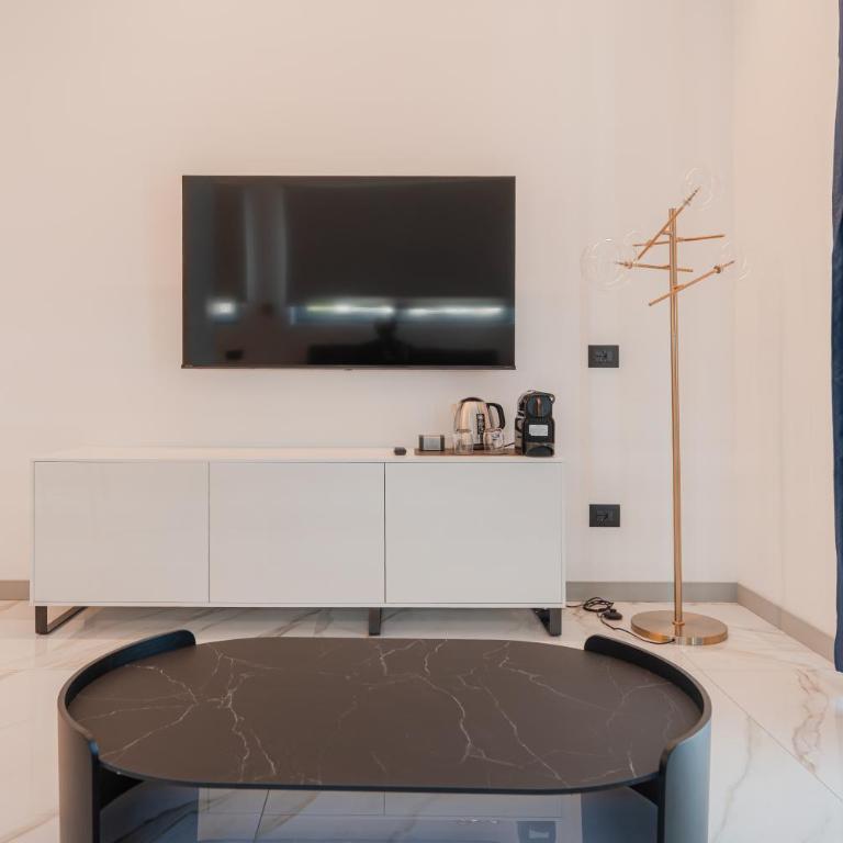 Hotel Villa Levi - Suite mit Kingsize-Bett und Meerblick - 14
