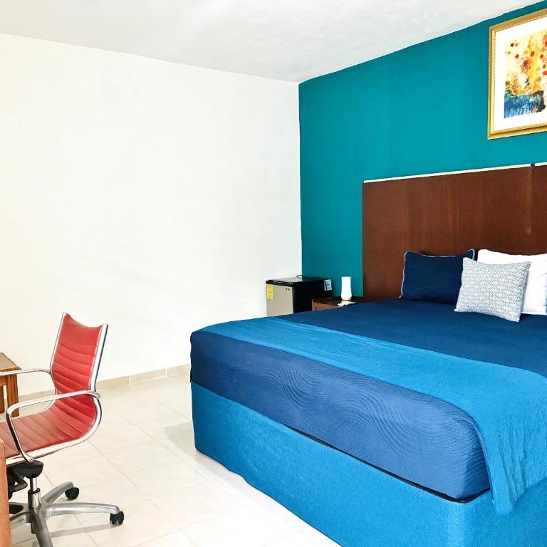 Hotel Palmeras Los Cabos - Habitación con cama extragrande. - 2
