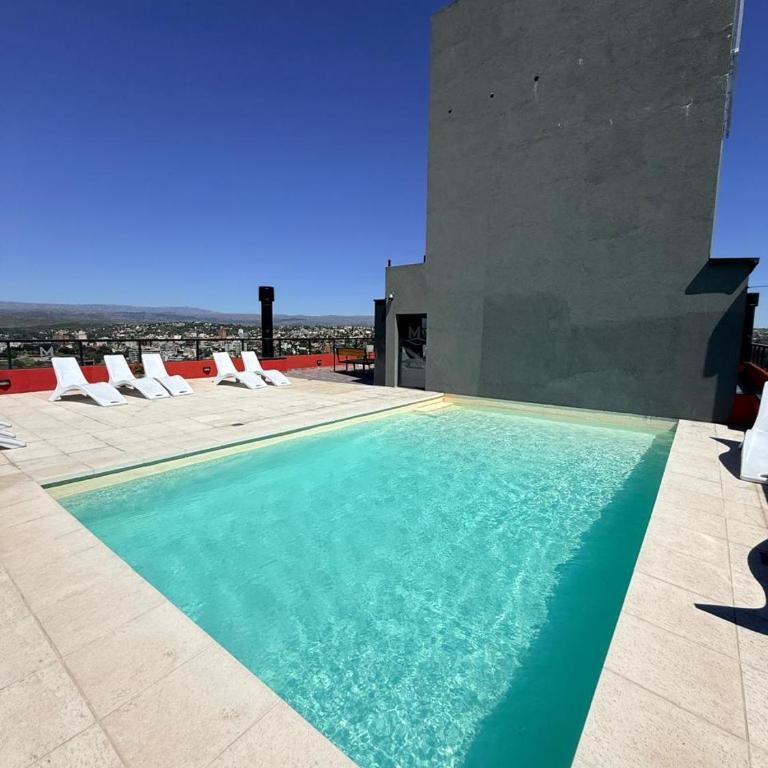 Dpto 4 pers -pileta- cochera- centro Carlos Paz M - Apartamento de 1 dormitorio - 39
