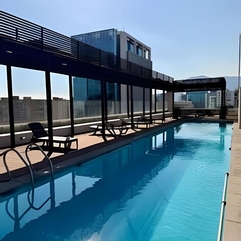 Comfort with parking and Wi-Fi Manquehue Metro Station - Two-Bedroom Apartment with Balcony and Terrace - 13