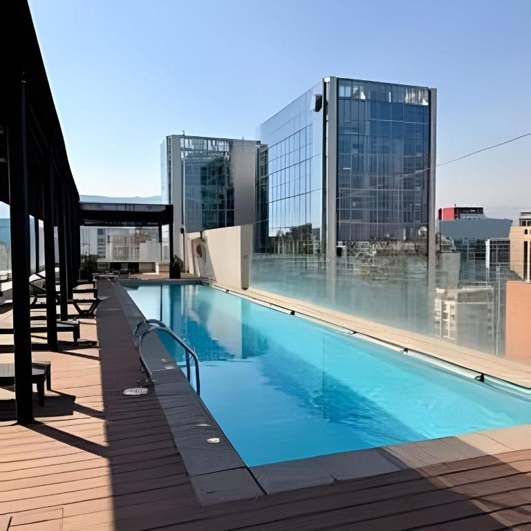 Comfort with parking and Wi-Fi Manquehue Metro Station - Two-Bedroom Apartment with Balcony and Terrace - 14