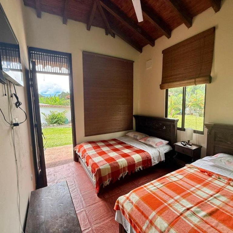 Habitación triple - Casa con 1 dormitorio - 8