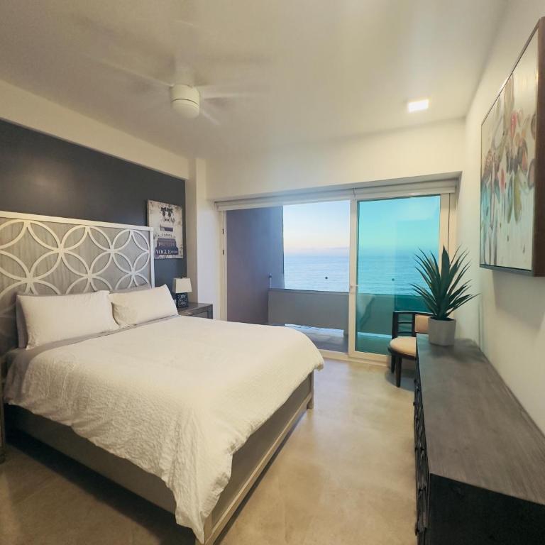 Beachfront paradise - Three-Bedroom Apartment - 36