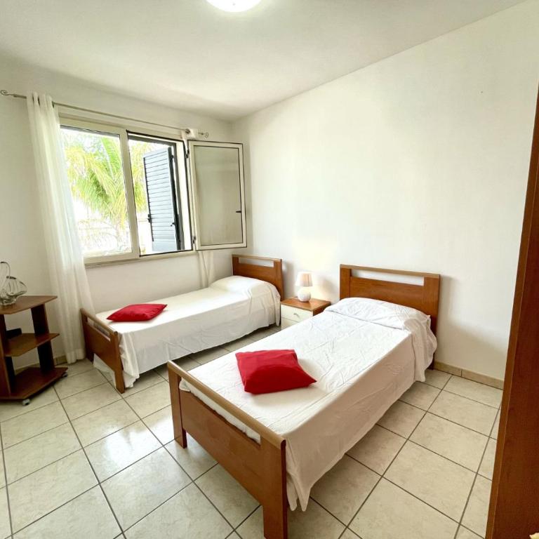 Appartamento in via Corsica, Torre San Giovanni 108 -Verso Sud - Appartamento con 2 Camere da Letto - 9