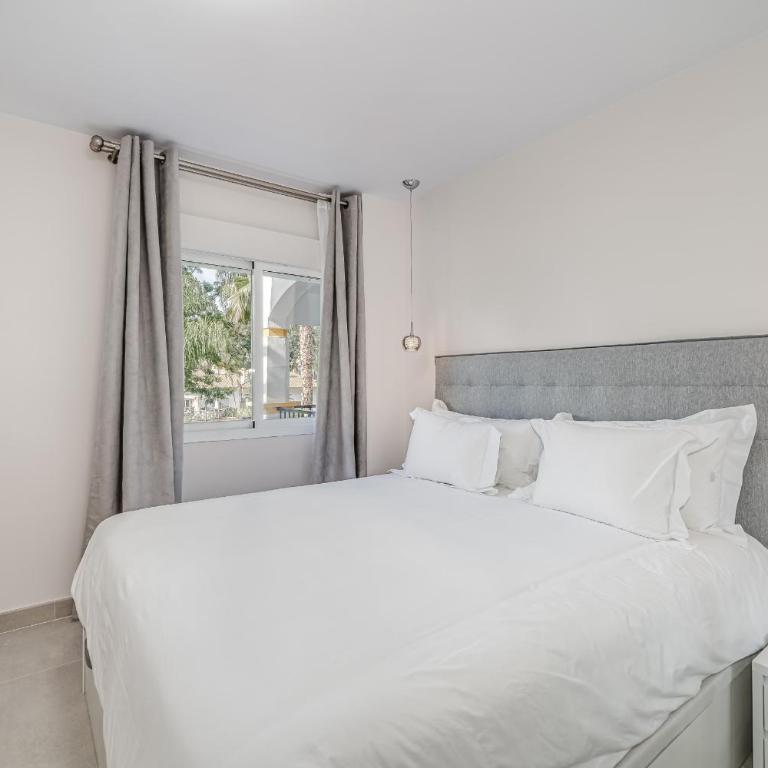 by RIVA - Elegant, 2 Bedroom Apartment in Dama de Noche Puerto Banus - Two-Bedroom Apartment with Garden View - 2