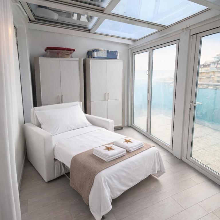Attico Fronte Mare con Terrazza e Garage Privato - Condominio Lara - Appartamento con Vista Mare - 9