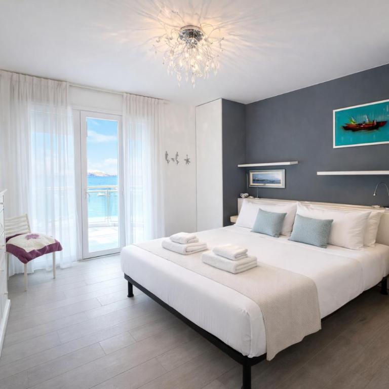 Attico Fronte Mare con Terrazza e Garage Privato - Condominio Lara - Appartamento con Vista Mare - 2