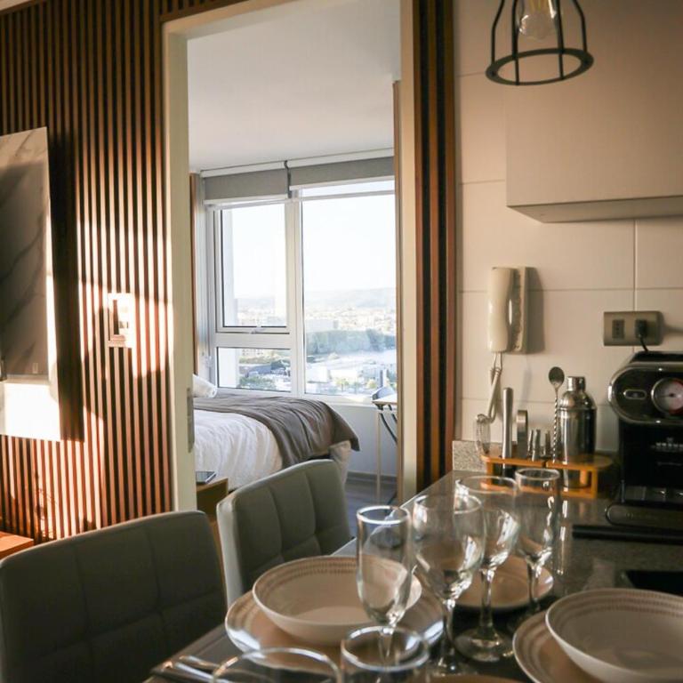 Departamento Premium Vista Laguna Cama King TV 55 Smart Lavadora Secadora Maquina de Cafe - Apartamento de 1 dormitorio - 22
