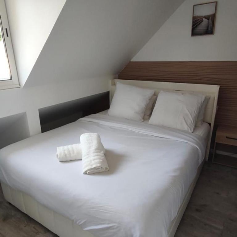Résidence des Fleurs - Les Escapades Familiales - 1 à 6 personnes - Two-Bedroom Apartment with Garden View - 11
