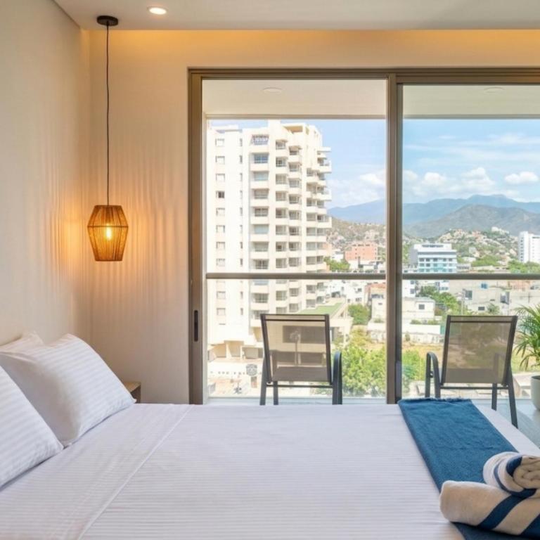 Loft de Lujo, Gym, Piscinas, Jacuzzis & Spa, A 5 Mn de Playa Gaira, A 10 Mn Playa Salguero y Playa Rodadero - Apartamento de 1 dormitorio con balcón y vistas a la montaña - 4