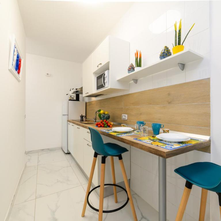 Estate4home - Suites Margar - Camera Quadrupla con Vista Mare - 13