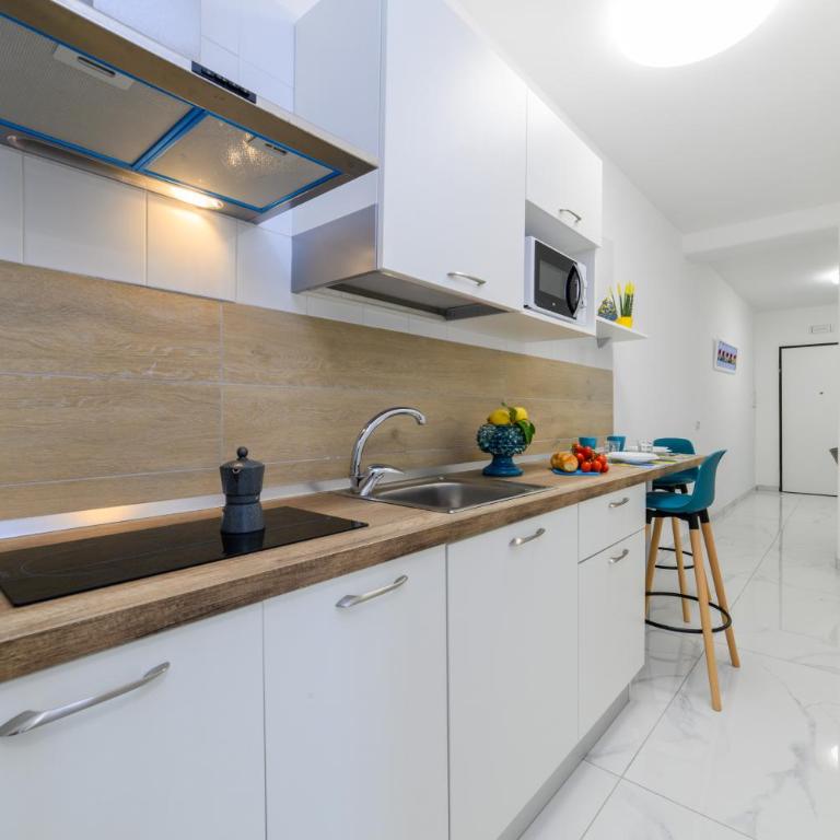 Estate4home - Suites Margar - Camera Quadrupla con Vista Mare - 17