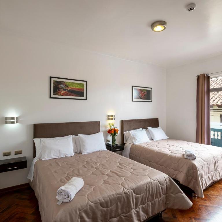 Hostal & Apartments El Triunfo - Habitación Doble Superior con vistas a la ciudad - 1 o 2 camas - 1