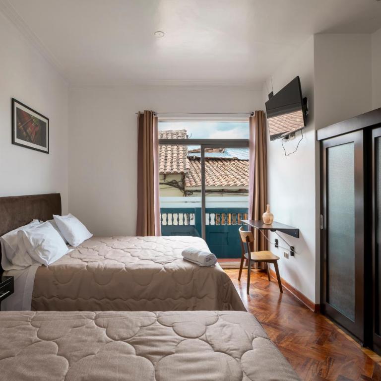 Hostal & Apartments El Triunfo - Habitación Doble Superior con vistas a la ciudad - 1 o 2 camas - 2