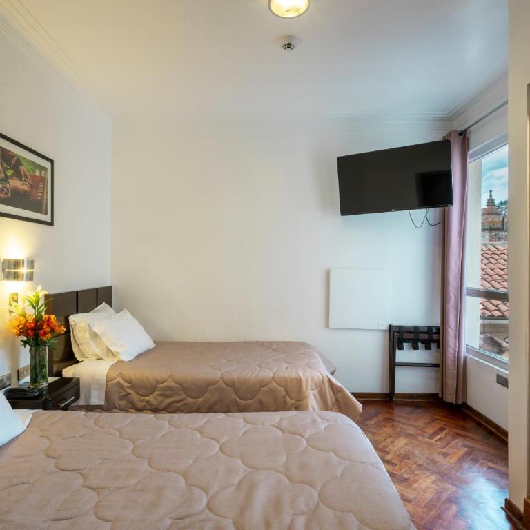 Hostal & Apartments El Triunfo - Habitación Doble - 2 camas - 6