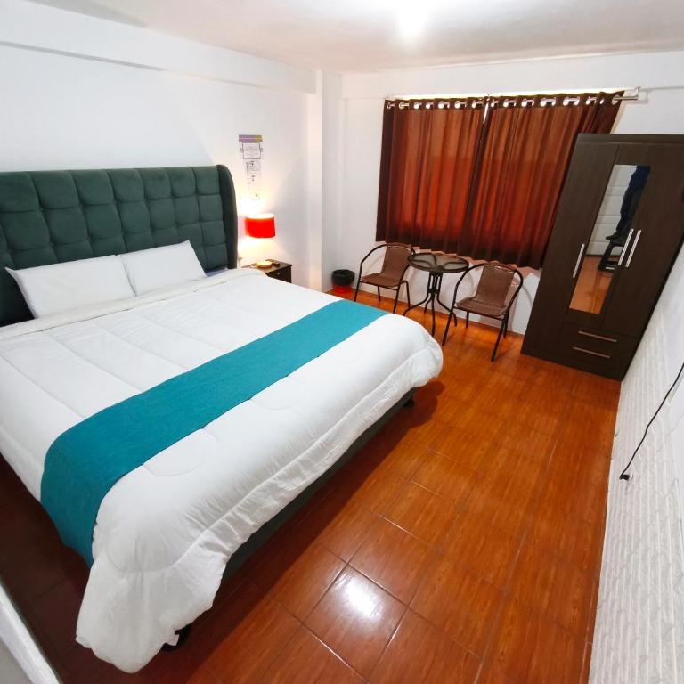 Cusco de mis Sueños - Habitación con cama extragrande. - 2