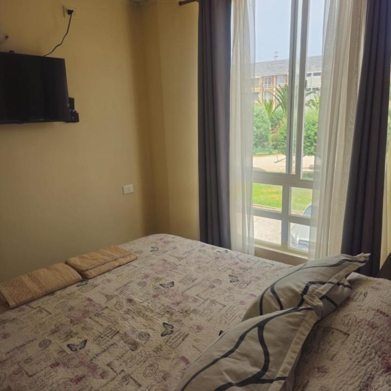 apartamento playa 4 esquinas - Three-Bedroom Apartment with Balcony - 12