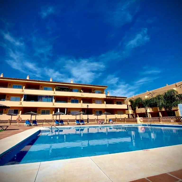 2 bed Elviria - 65sqm Terrace - Pools - Walk to Beach - Two-Bedroom Apartment - 4