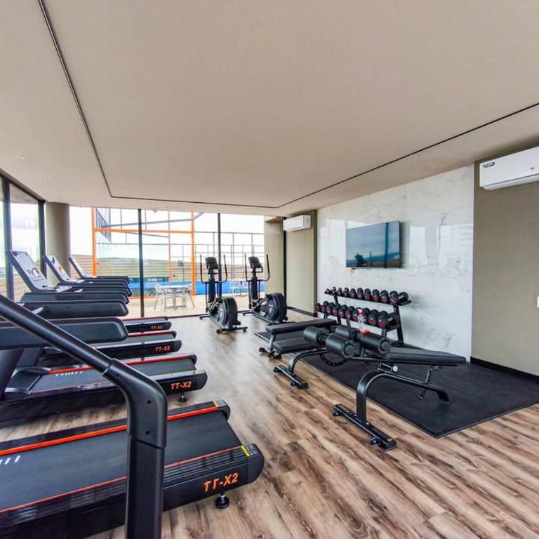 Balcon - Area de trabajo - Gym - Piscina - Sauna - One-Bedroom Apartment - 8