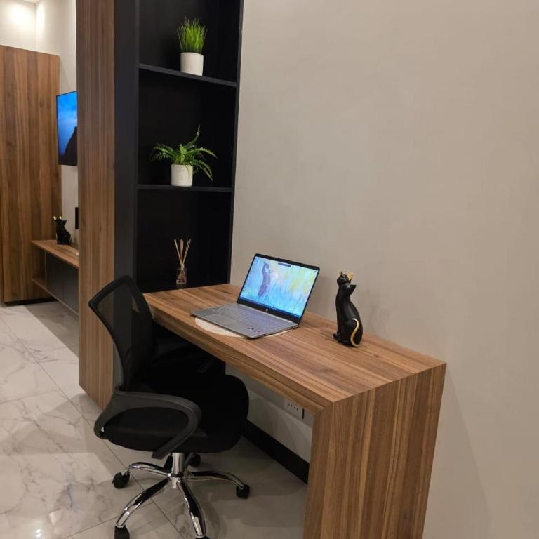 Balcon piso 17 - Escritorio - Piscina - Gym - One-Bedroom Apartment - 2