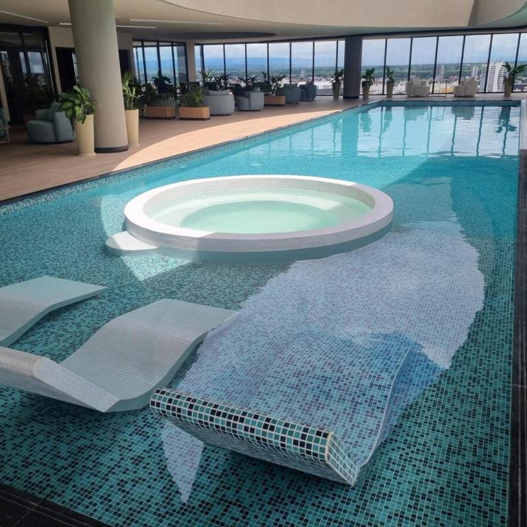 Balcon piso 17 - Escritorio - Piscina - Gym - One-Bedroom Apartment - 6