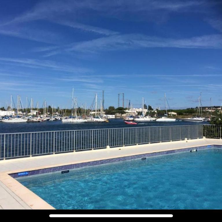 Studio - Bellevue agréable toutes saison 4 couchages - climatisation - parking privé - piscine sur mer - vue magnifique et rare - situation optimum - les argonautes - Ile des pêcheurs - Cap d'Agde - One-Bedroom Apartment - 7
