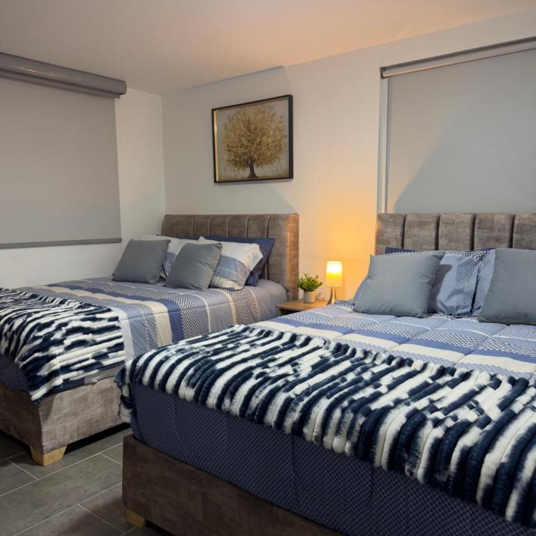 Apartamento lujoso cerca al aeropuerto - Two-Bedroom Apartment - 11