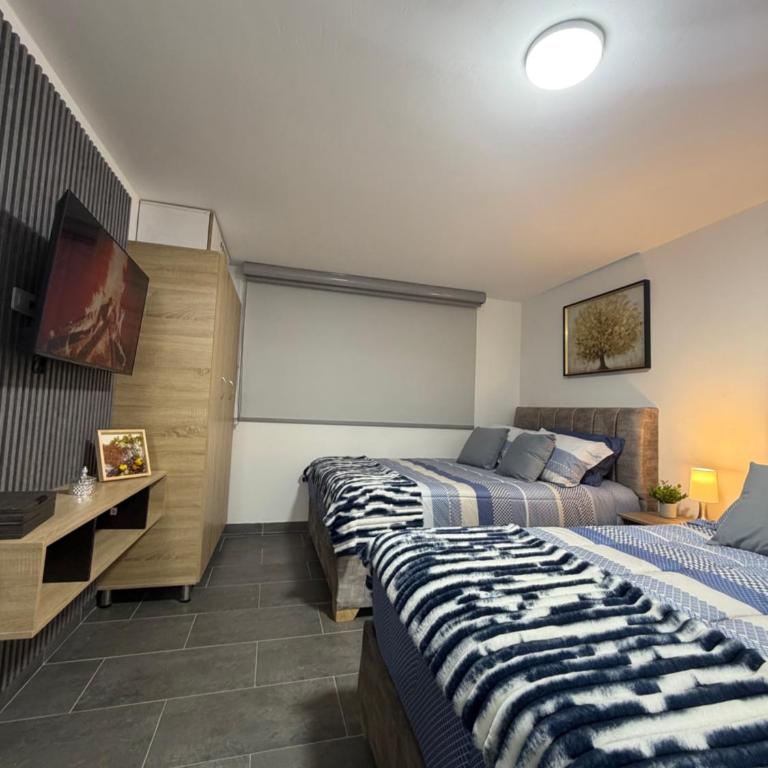 Apartamento lujoso cerca al aeropuerto - Two-Bedroom Apartment - 9
