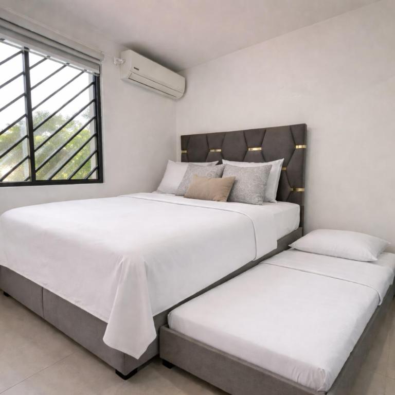 Casa con jacuzzi en La Aurora, Guayaquil, 3 habitaciones, ideal para familias, con sala, comedor y cocina equipada - Three-Bedroom Apartment - 7