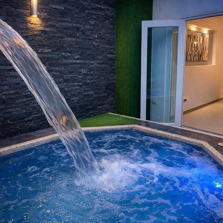 Casa con jacuzzi en La Aurora, Guayaquil, 3 habitaciones, ideal para familias, con sala, comedor y cocina equipada - Three-Bedroom Apartment - 18