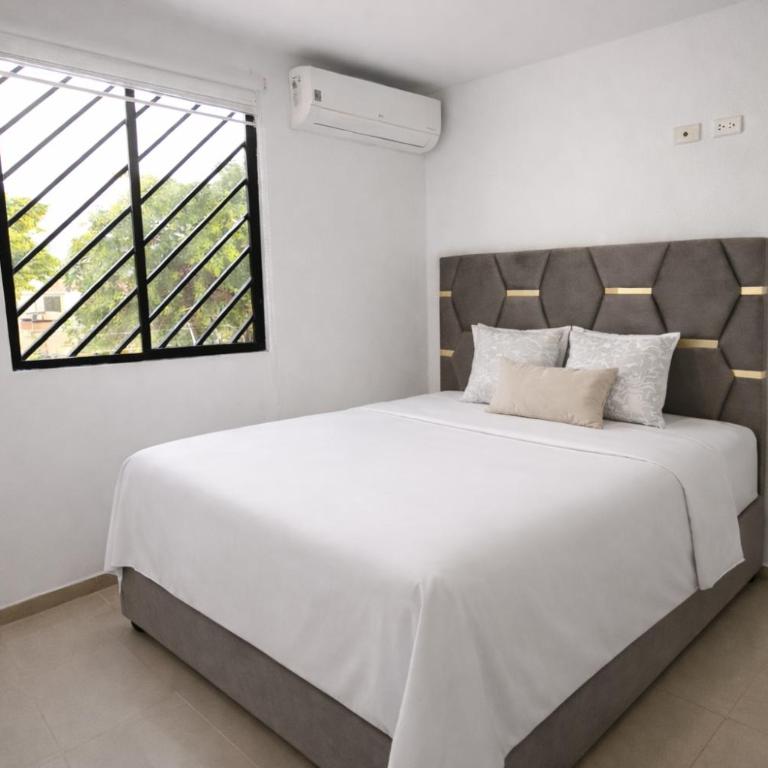 Casa con jacuzzi en La Aurora, Guayaquil, 3 habitaciones, ideal para familias, con sala, comedor y cocina equipada - Three-Bedroom Apartment - 26