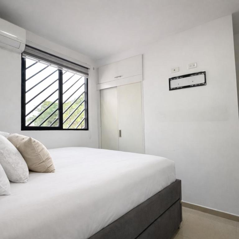 Casa con jacuzzi en La Aurora, Guayaquil, 3 habitaciones, ideal para familias, con sala, comedor y cocina equipada - Three-Bedroom Apartment - 32