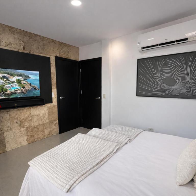 Casa con jacuzzi en La Aurora, Guayaquil, 3 habitaciones, ideal para familias, con sala, comedor y cocina equipada - Three-Bedroom Apartment - 38