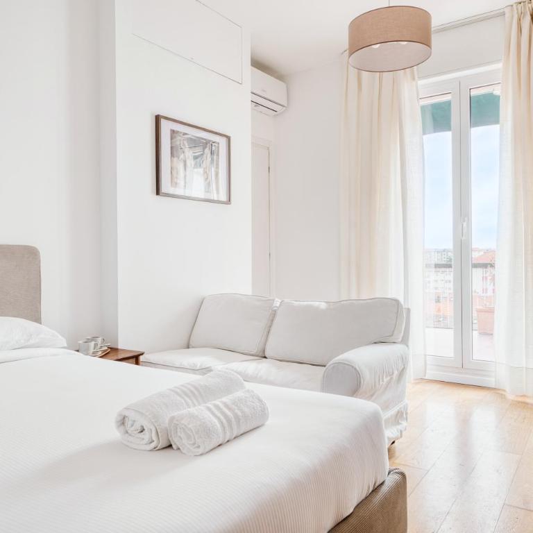 Top-floor penthouse with panoramic terrace - 20 minutes from San Siro & Duomo - Appartamento con 2 Camere da Letto - 12