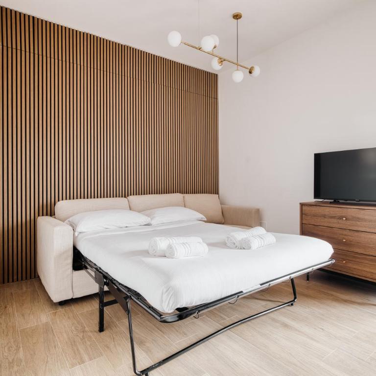 Top-floor penthouse with panoramic terrace - 20 minutes from San Siro & Duomo - Appartamento con 2 Camere da Letto - 29