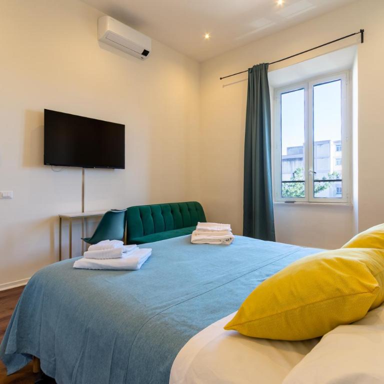 Stella Merulana - Appartamento con 2 Camere da Letto - 1