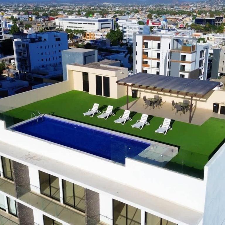 Acogedor depa a 1 cuadra de la playa con rooftop view - Apartment - 10