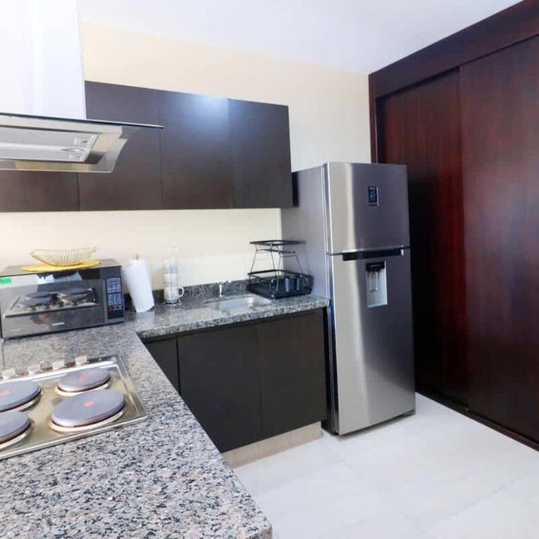 Acogedor depa a 1 cuadra de la playa con rooftop view - Apartment - 18