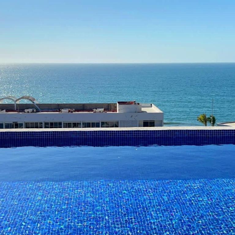 Acogedor depa a 1 cuadra de la playa con rooftop view - Apartment - 33