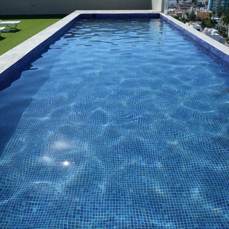 Acogedor depa a 1 cuadra de la playa con rooftop view - Apartment - 35