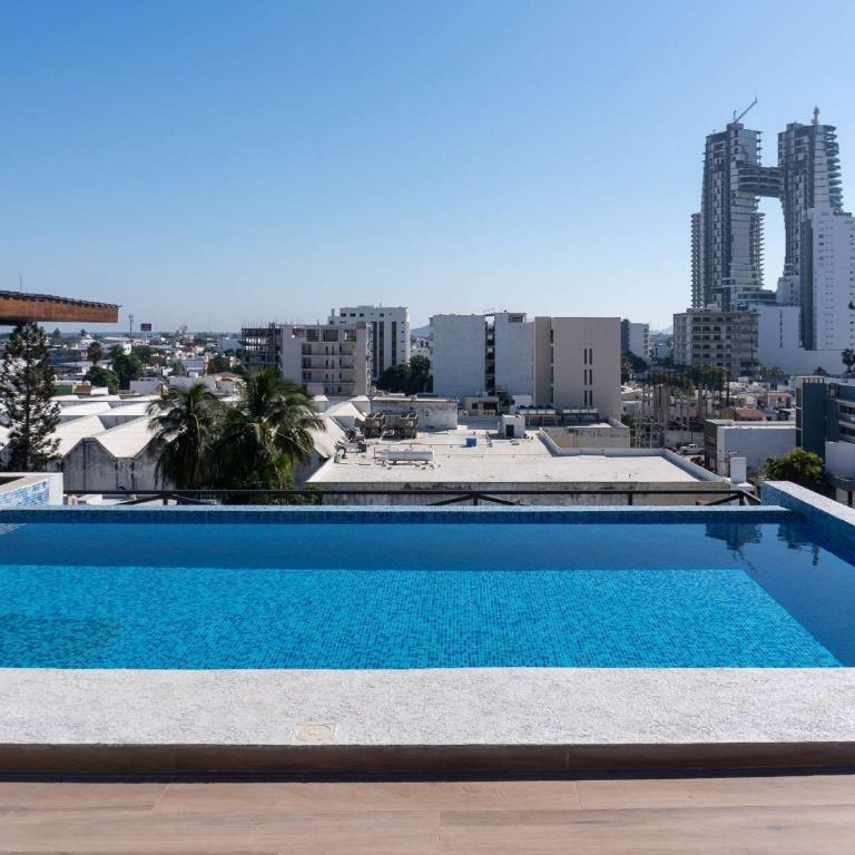 Sunset Rooftop Pool Near the Beach - Apartment - 1